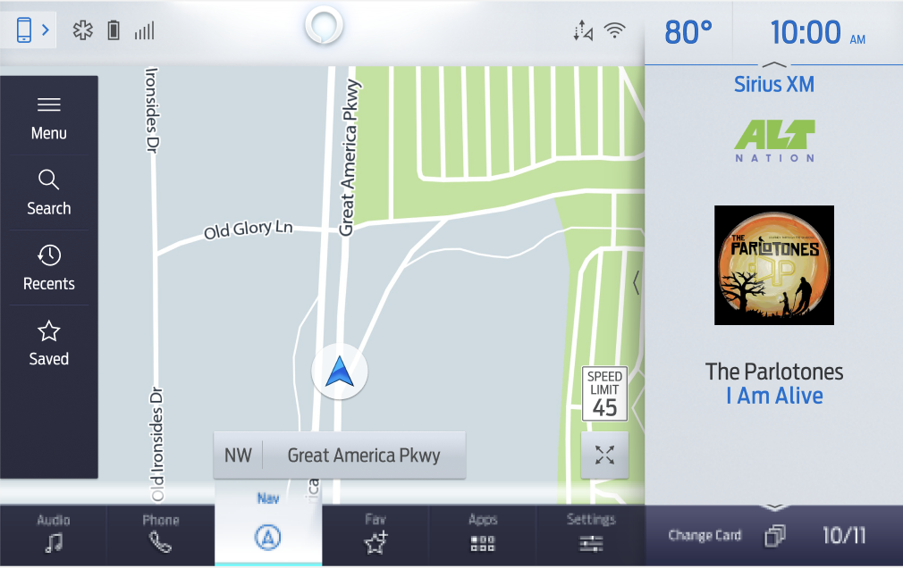 Ford 12-inch map view in a light theme, with the Menu, Search, Recents and Saved rail and a media card