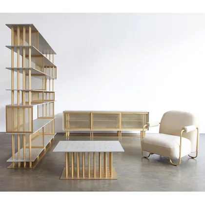 Brass-framed shelving, coffee table, sideboard and armchair