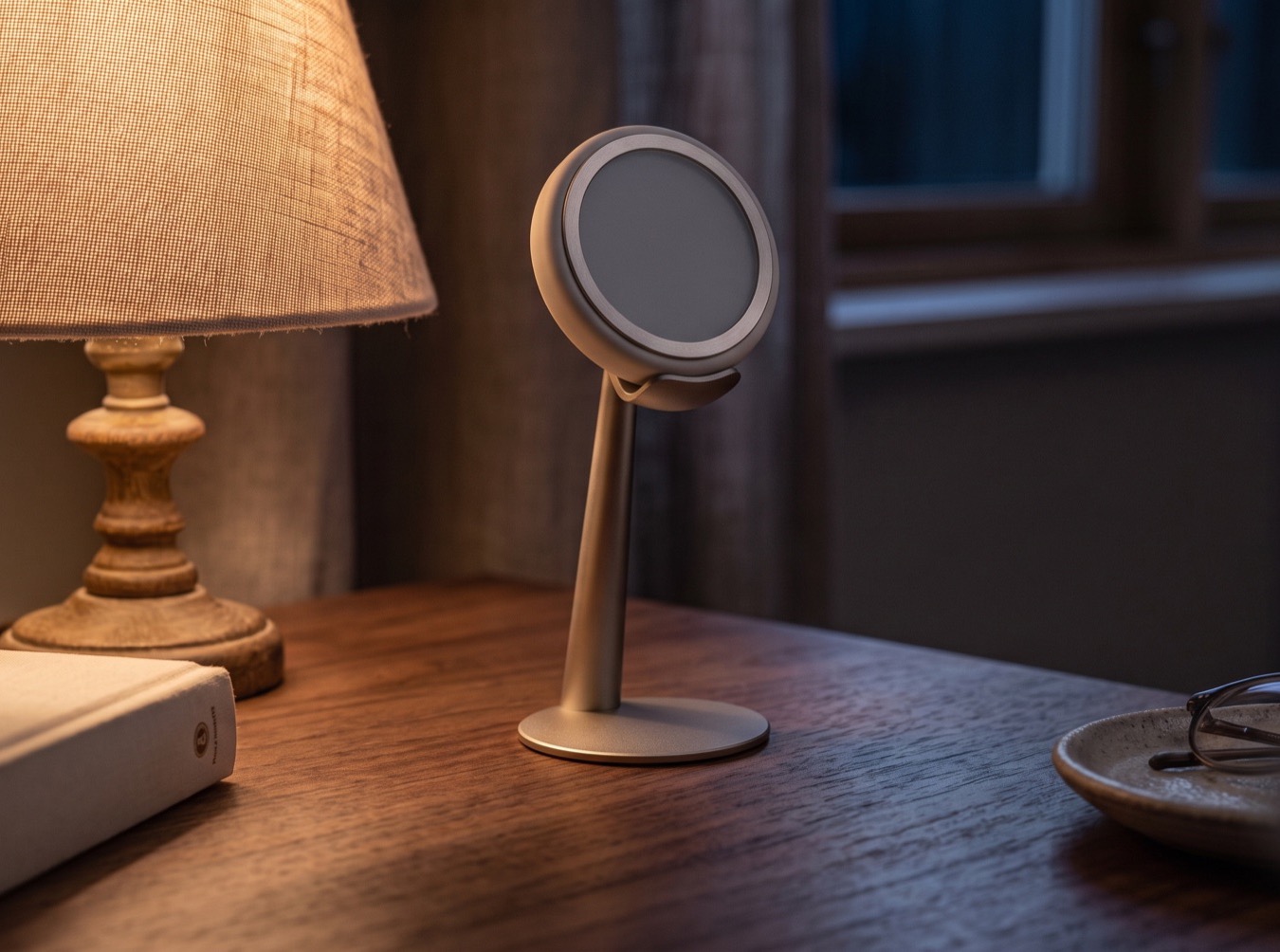 Amber: a screenless AI companion pendant glowing on its bedside stand
